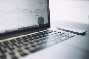 Free MacBook with analytics charts